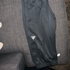Women Adidas soccer pants w/zipper.